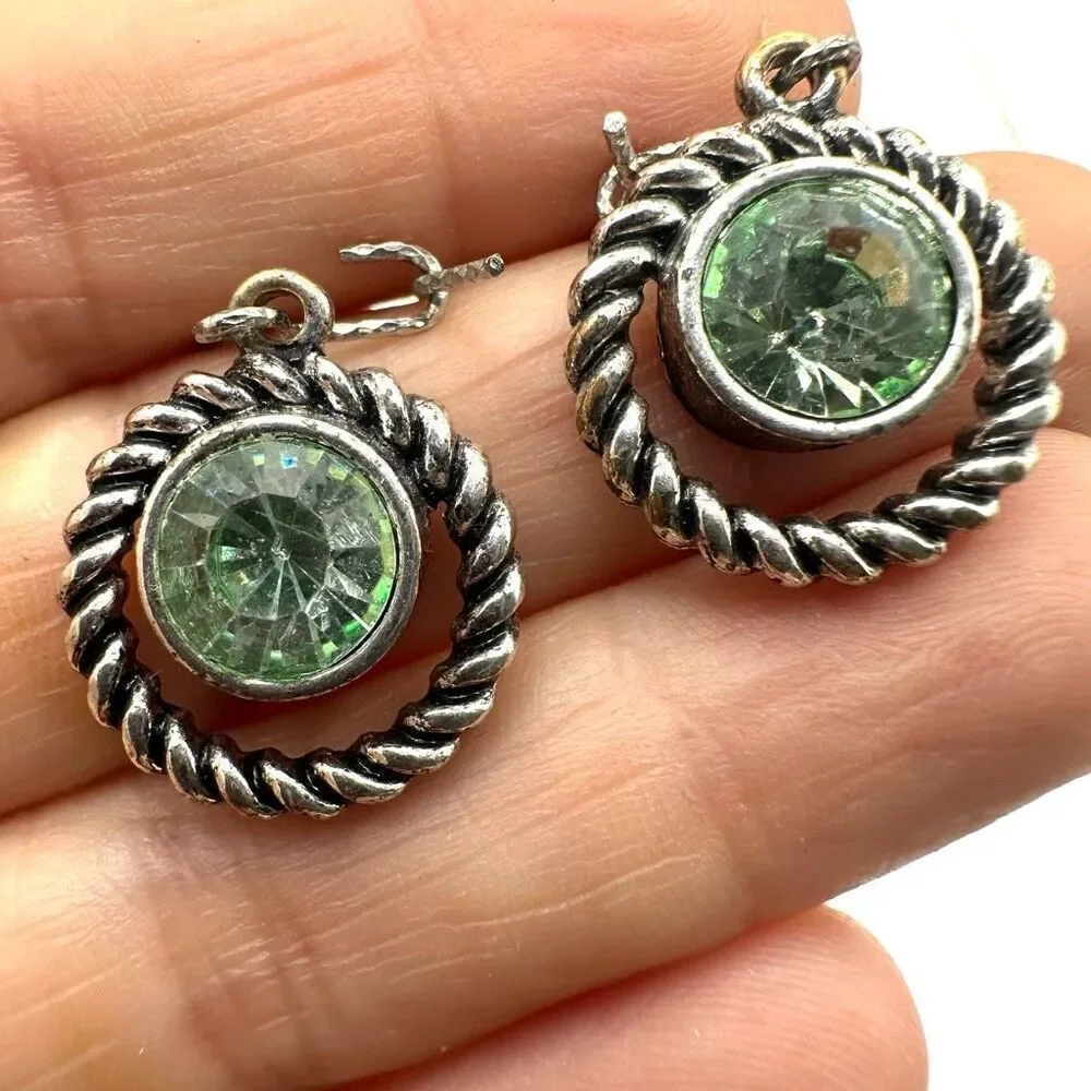 Silver tone green crystal dangling earrings